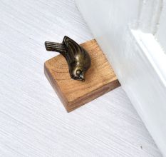 Handcrafted Wooden Door Stopper with Iron Bird